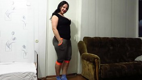 A mature BBW strips and fucks with a dildo on the floor, on a chair, and on a table. Milf shakes big natural tits and masturbates her shaved cunt. Amateur.
